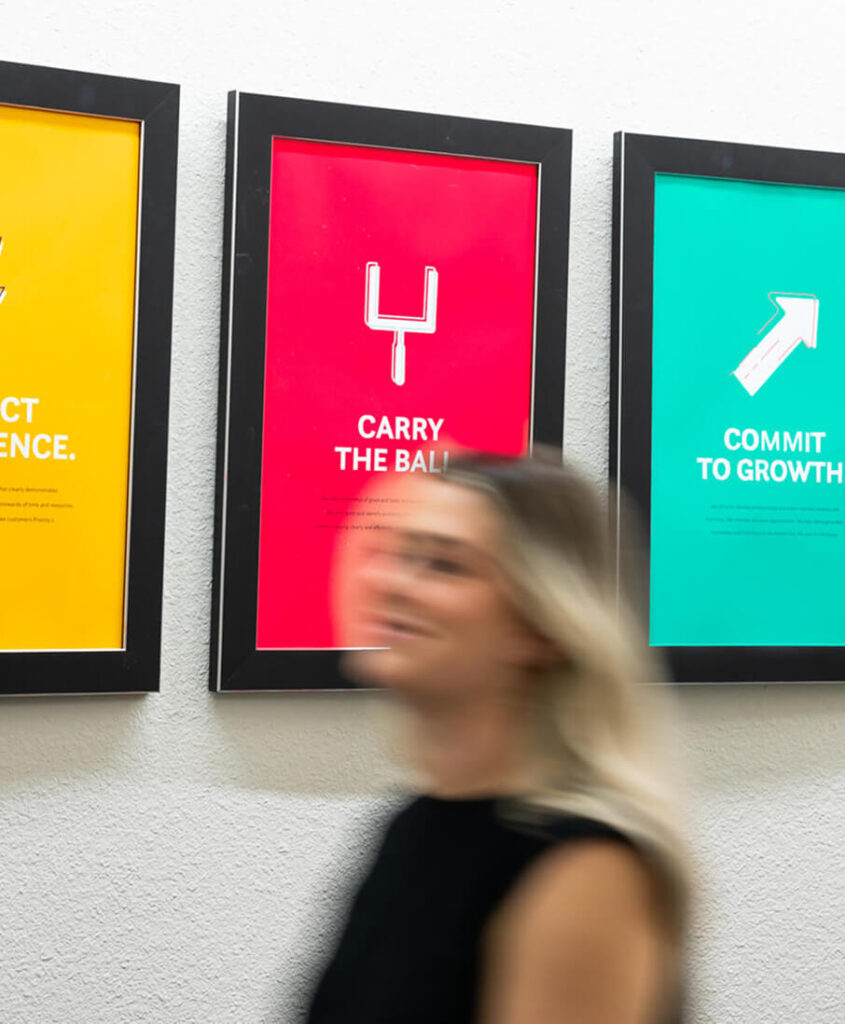 Pictures of Curious Jane core values on wall