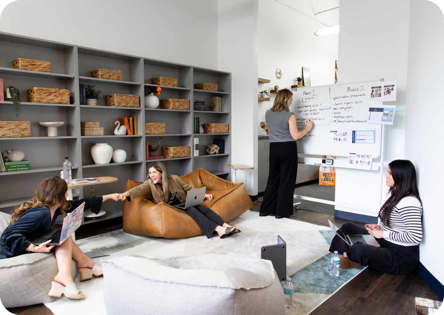 Curious Jane team relaxing in the office.